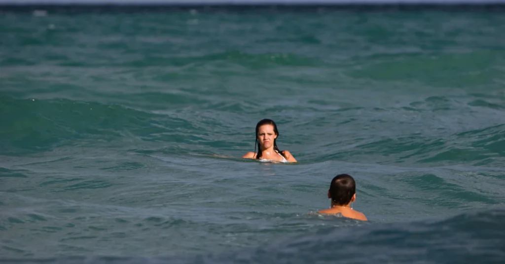 Bermuda swimming season, two people swimming in the ocean