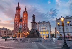 Kraków Main Market Square at dusk with St. Mary's Basilica