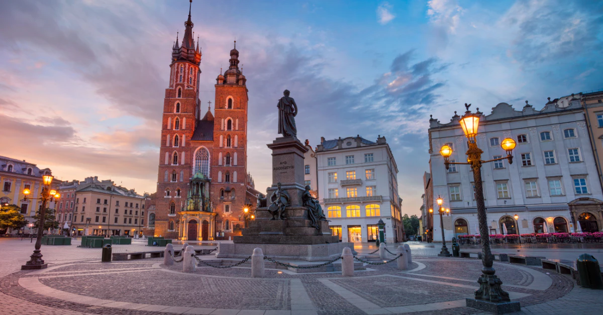 Kraków Main Market Square at dusk with St. Mary's Basilica