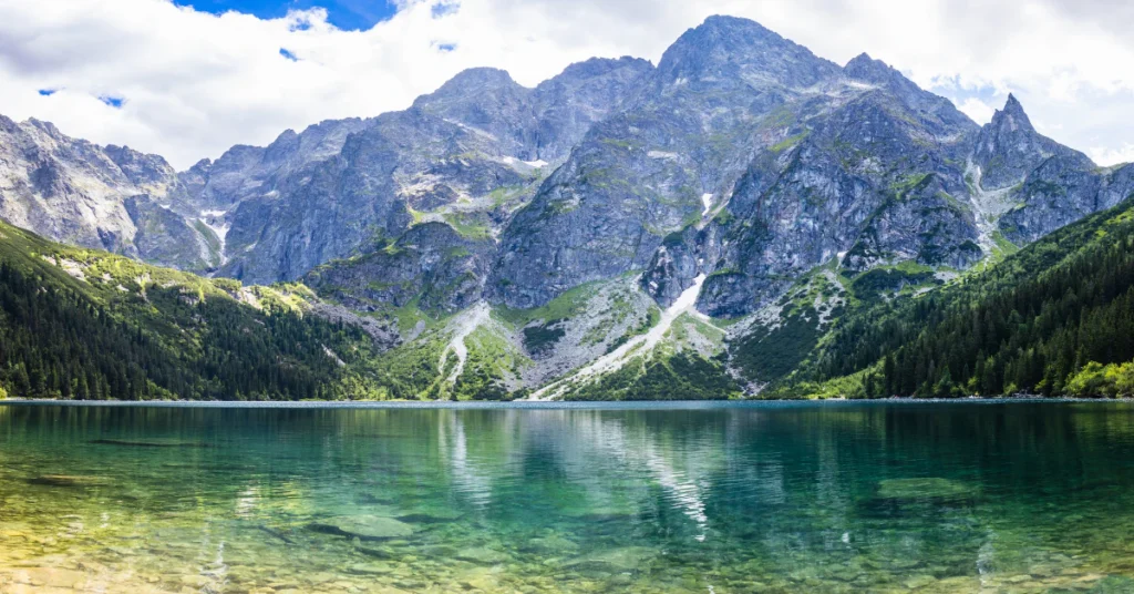 Mountain lake surrounded by peaks in the Tatra Mountains